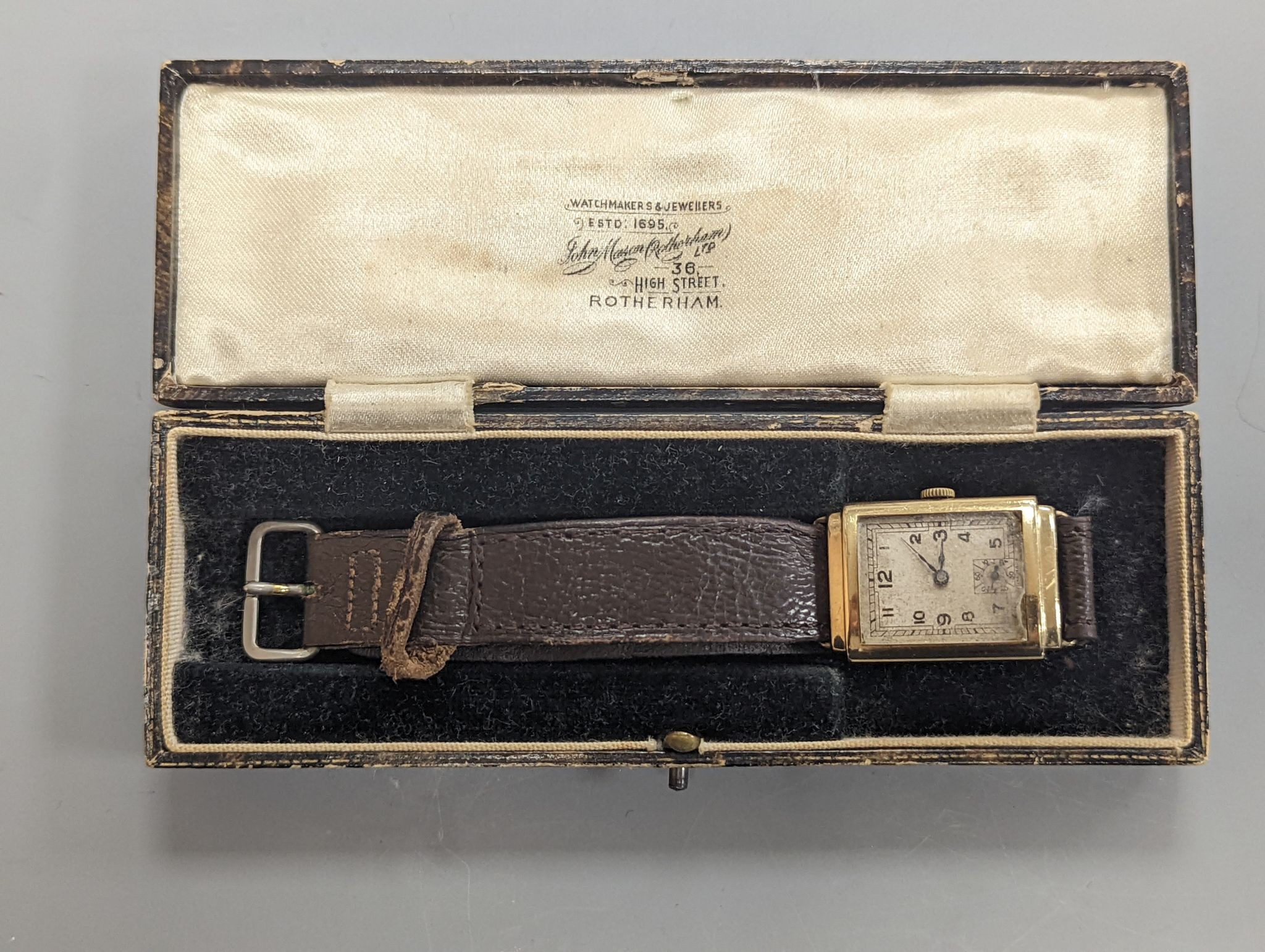 A gentleman's 1930's 9ct gold rectangular dial manual wind gold wrist watch.